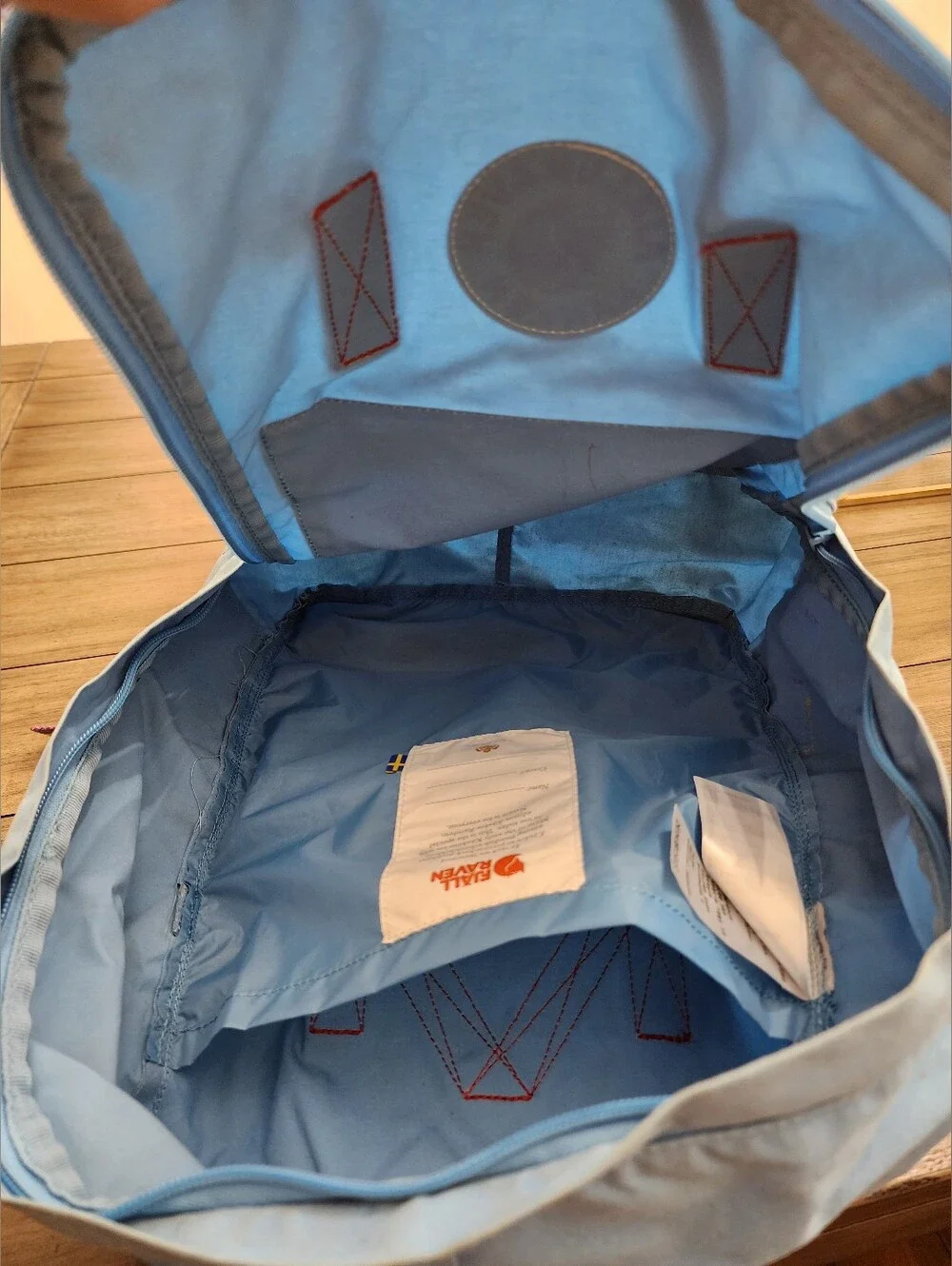 Classic Light Blue Backpack with Rainbow Accents